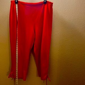 WOMENS Red pants with lace up ties on the leg bottom (size equivalent to a 16w)